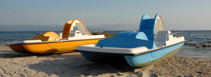 Paddle boats on the beach